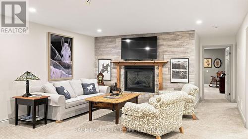 7632 County 9 Road, Clearview, ON - Indoor Photo Showing Living Room With Fireplace