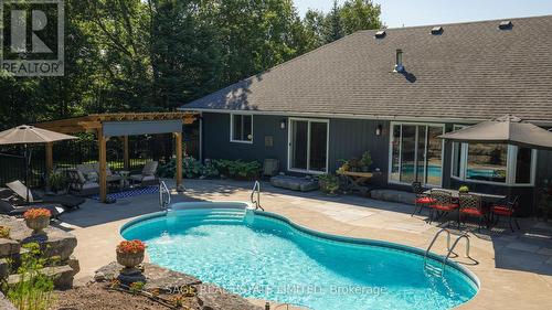 7632 County 9 Road, Clearview, ON - Outdoor With In Ground Pool With Deck Patio Veranda