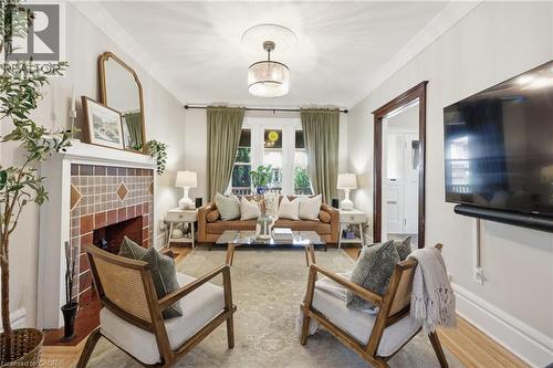 70 Gage Avenue S, Hamilton, ON - Indoor Photo Showing Living Room With Fireplace