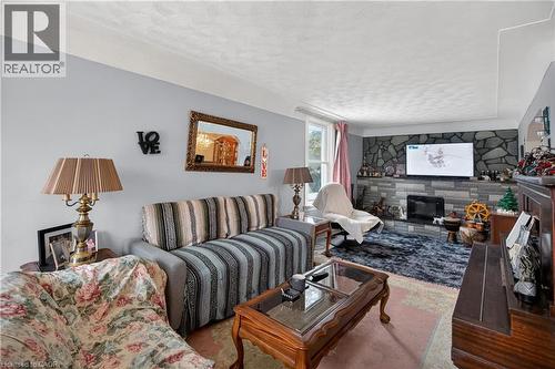 312 East 12Th Street, Hamilton, ON - Indoor Photo Showing Living Room With Fireplace