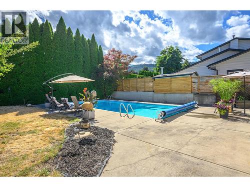 7807 Corona Court, Coldstream, BC - Outdoor With In Ground Pool