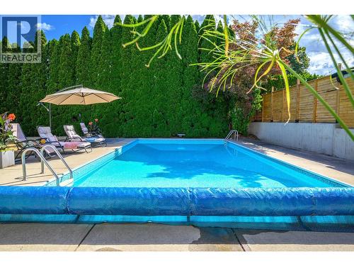 7807 Corona Court, Coldstream, BC - Outdoor With In Ground Pool With Backyard