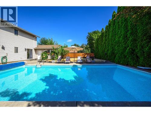 7807 Corona Court, Coldstream, BC - Outdoor With In Ground Pool With Backyard