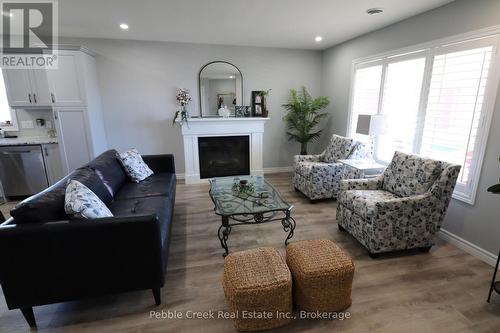 179 Lake Breeze Drive, Ashfield-Colborne-Wawanosh (Colborne), ON - Indoor Photo Showing Living Room With Fireplace