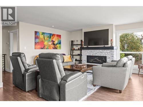 Living Room - 4119 15 Avenue, Vernon, BC - Indoor Photo Showing Living Room With Fireplace