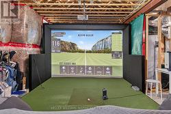 Basement Ceilings accommodates Virtual Golf - 