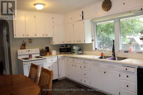 34 Mcdonald Street, New Tecumseth, ON - Indoor Photo Showing Kitchen With Double Sink