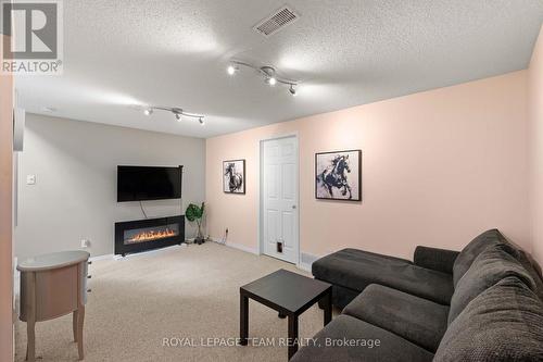 6 Folison Street, Ottawa, ON - Indoor Photo Showing Living Room With Fireplace