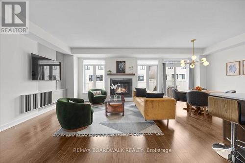 1027 Hydrangea Avenue, Ottawa, ON - Indoor Photo Showing Living Room With Fireplace