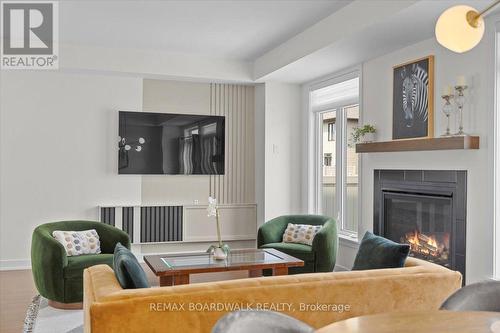 1027 Hydrangea Avenue, Ottawa, ON - Indoor Photo Showing Living Room With Fireplace