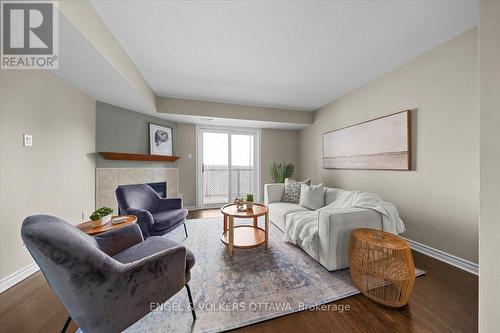 9 - 2820 Baseline Road, Ottawa, ON - Indoor Photo Showing Living Room With Fireplace