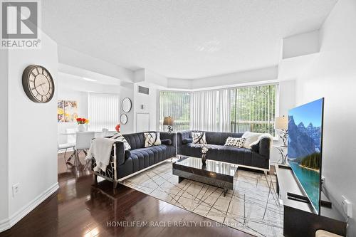 406 - 325 Webb Drive, Mississauga, ON - Indoor Photo Showing Living Room