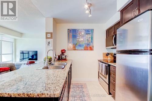 2205 - 208 Enfield Place, Mississauga, ON - Indoor Photo Showing Kitchen With Double Sink