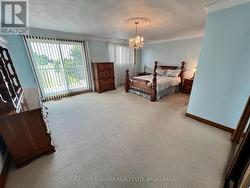 Spacious Master with Glass Patio Doors to Balcony - 