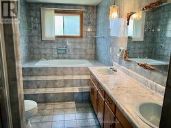 Main Bath all Tiled with Tub and Shower - 