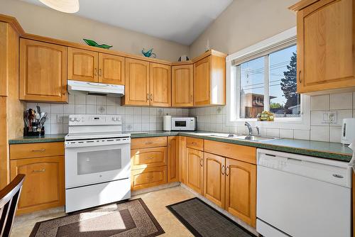 3907 3905 54 Street, Wetaskiwin, AB - Indoor Photo Showing Kitchen With Double Sink
