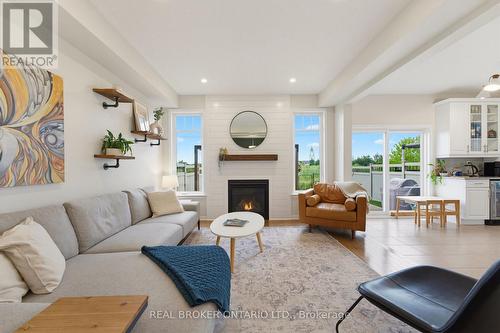 76 Tapadero Avenue, Ottawa, ON - Indoor Photo Showing Living Room With Fireplace