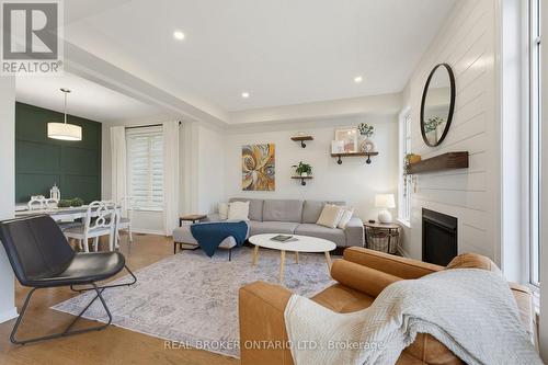 76 Tapadero Avenue, Ottawa, ON - Indoor Photo Showing Living Room With Fireplace