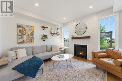 76 Tapadero Avenue, Ottawa, ON - Indoor Photo Showing Living Room With Fireplace