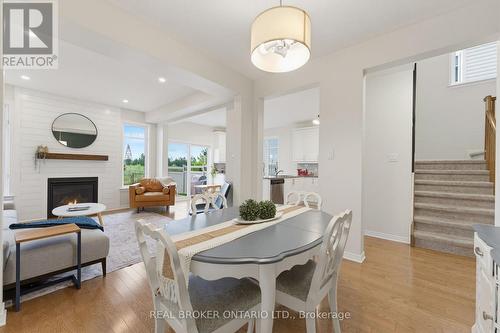 76 Tapadero Avenue, Ottawa, ON - Indoor Photo Showing Dining Room With Fireplace