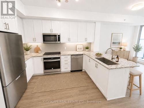 VIRTUAL STAGED - Kitchen - 1003 - 9618 Yonge Street, Richmond Hill, ON - Indoor Photo Showing Kitchen With Upgraded Kitchen