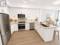 VIRTUAL STAGED - Kitchen - 