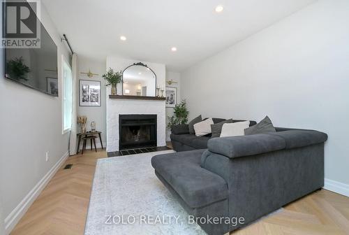 1077 Anna Maria Avenue, Innisfil, ON - Indoor Photo Showing Living Room With Fireplace