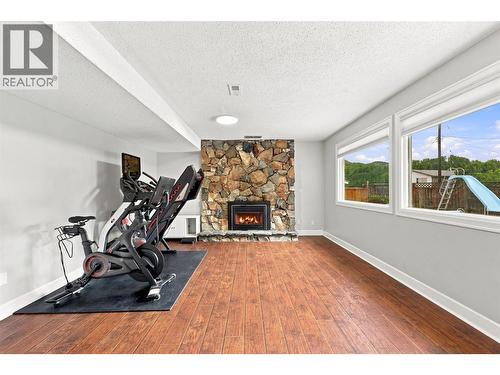 364 Collingwood Drive, Kamloops, BC - Indoor Photo Showing Gym Room With Fireplace