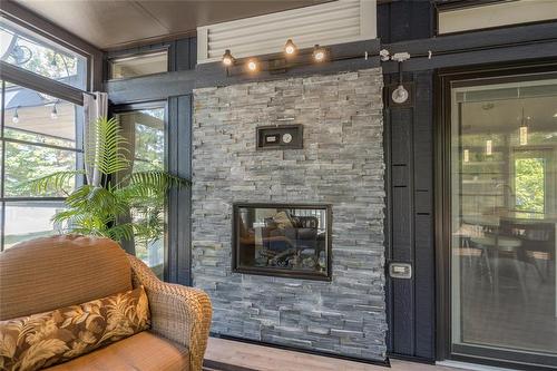 110 37116 37N Road, Ste Anne Rm, MB - Indoor Photo Showing Living Room With Fireplace