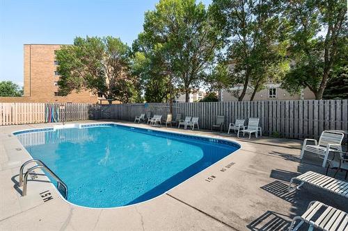 406-85 Swindon Way, Winnipeg, MB - Outdoor With In Ground Pool With Backyard