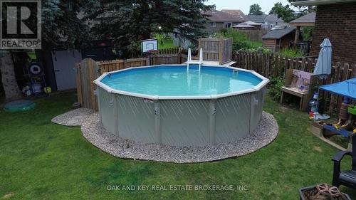 26 Sinclair Avenue, St. Thomas, ON - Outdoor With Above Ground Pool With Backyard