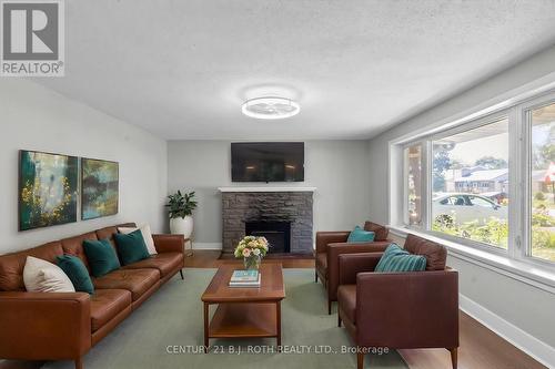 323 Crawford Street, Orillia, ON - Indoor Photo Showing Living Room With Fireplace