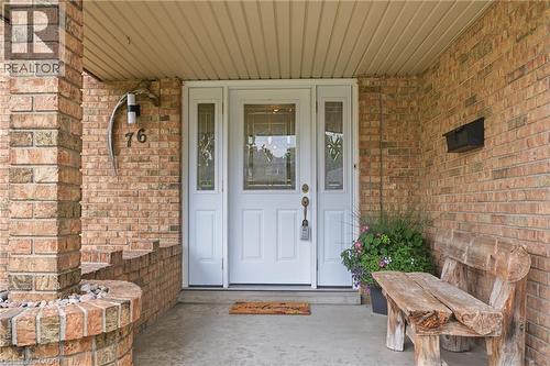 Brick exterior with a covered concrete porch - 76 Lower Canada Crescent, Kitchener, ON - Outdoor With Deck Patio Veranda With Exterior