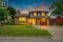 Two-story residence featuring a brick and siding exterior with a brown shingle roof - 76 Lower Canada Crescent, Kitchener, ON  - Outdoor 