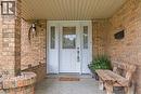 Brick exterior with a covered concrete porch - 76 Lower Canada Crescent, Kitchener, ON  - Outdoor With Deck Patio Veranda With Exterior 