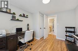 Light-toned walls complement wood-finish flooring - 