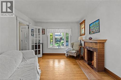 37 Park Row N, Hamilton, ON - Indoor Photo Showing Living Room With Fireplace