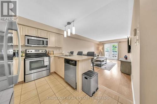 6 - 2557 Sixth Line W, Oakville, ON - Indoor Photo Showing Kitchen With Double Sink