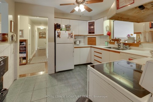 12881 27 Highway S, King, ON - Indoor Photo Showing Kitchen With Double Sink