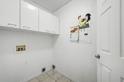 Laundry - 102-775 Rue Rodier, Saint-Jean-Sur-Richelieu, QC - Indoor Photo Showing Other Room