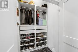 Massive closet coming in from garage entrance. - 