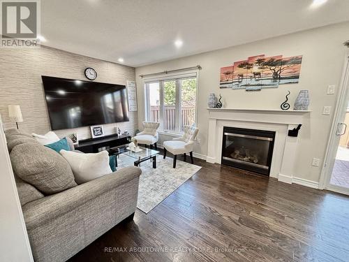 36 Van Fleet Terrace, Milton, ON - Indoor Photo Showing Living Room With Fireplace