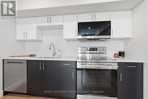 167 Bowman Drive, Middlesex Centre (Ilderton), ON - Indoor Photo Showing Kitchen With Double Sink With Upgraded Kitchen