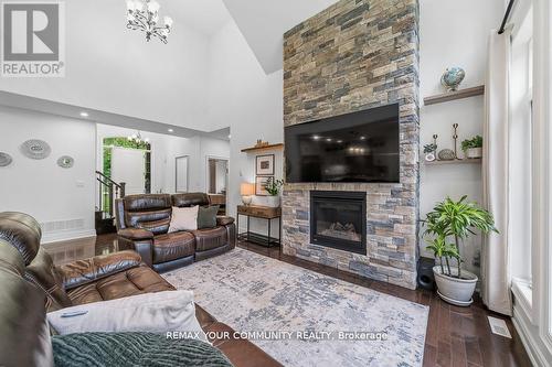 38 Windermere Circle, Tay, ON - Indoor Photo Showing Living Room With Fireplace