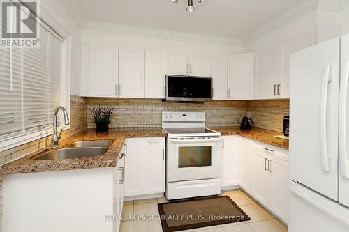 2694 Truscott Drive, Mississauga, ON - Indoor Photo Showing Kitchen With Double Sink