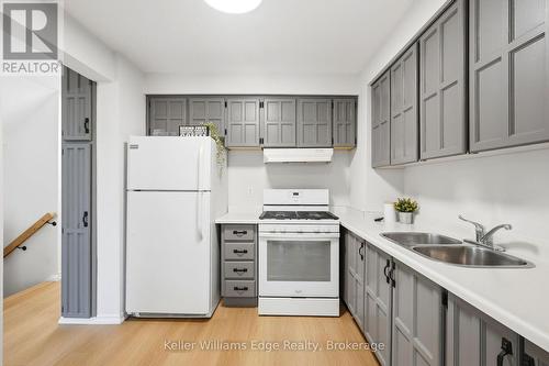 23 - 333 Meadows Boulevard, Mississauga (Rathwood), ON - Indoor Photo Showing Kitchen With Double Sink
