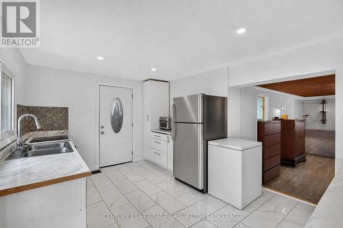6756 Hwy 38 Highway, Frontenac (Frontenac South), ON - Indoor Photo Showing Kitchen With Double Sink