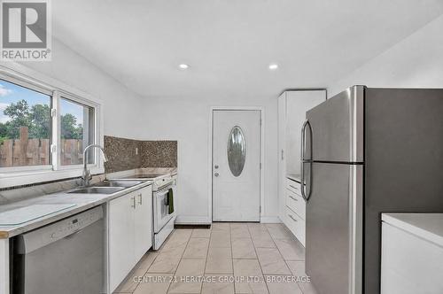 6756 Hwy 38 Highway, Frontenac (Frontenac South), ON - Indoor Photo Showing Kitchen With Double Sink