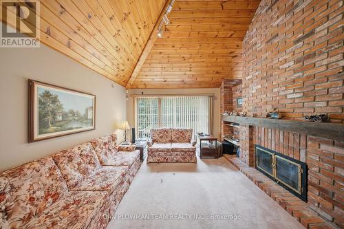 3310 Old Scugog Road, Clarington, ON - Indoor Photo Showing Living Room With Fireplace