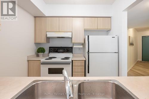 95 Wellington St #213 Bowmanville - 213 - 95 Wellington Street, Clarington (Bowmanville), ON - Indoor Photo Showing Kitchen With Double Sink